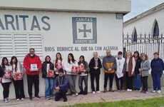 Alumnos y profesores del Sta María Goretti junto a colaboradores de Cáritas preparados para la Colecta