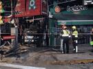 Imagen de San Nicolás: Chocaron dos autos y uno se incrustó en un local que se incendió. El saldo ocho heridos