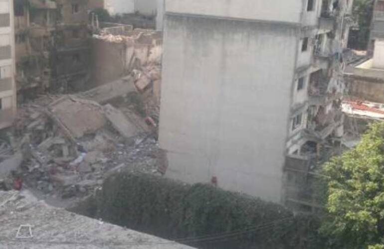 Las dos torres que quedaron en pie, en el medio el edificio que desapareció