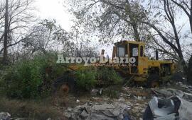 &iquest;Tirada?: La motoniveladora est&aacute; en el ex basural de Arroyo Seco