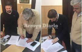 En la municipalidad. La firma del convenio se efectuó en el despacho del intendente Esper.