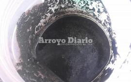 Muestra tomada por vecino. Pasta negra o con un olor insoportable.