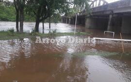 El arroyo Pav&oacute;n desbordado.