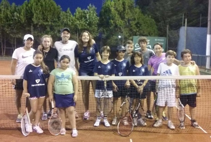 Los profesores De Rienzo y La Viola con sus alumnos.