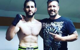 Ezequiel y su entrenador Maxi Fer tras ser Campe&oacute;n.