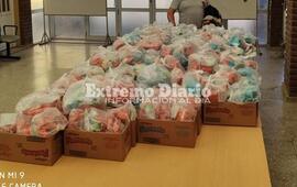 Imagen de Entrega de vianda seca perteneciente al aporte de &acute;Copa de Leche&acute;