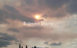 Imagen de A la espera de la lluvia que termine con el humo